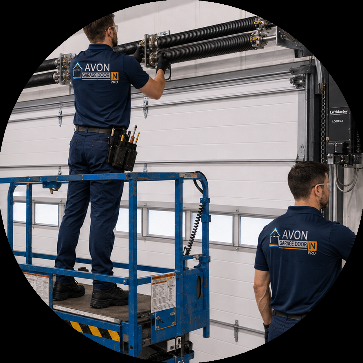 Garage Door Pro technicians installing duplex high-cycle torsion springs 